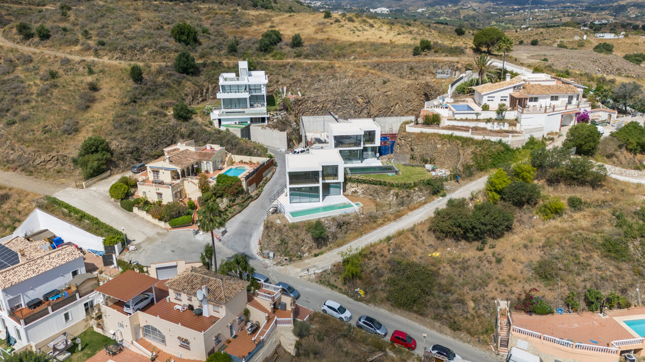 Chic new villa in a desirable gated community is a superb opportunity to live in luxury and elegance