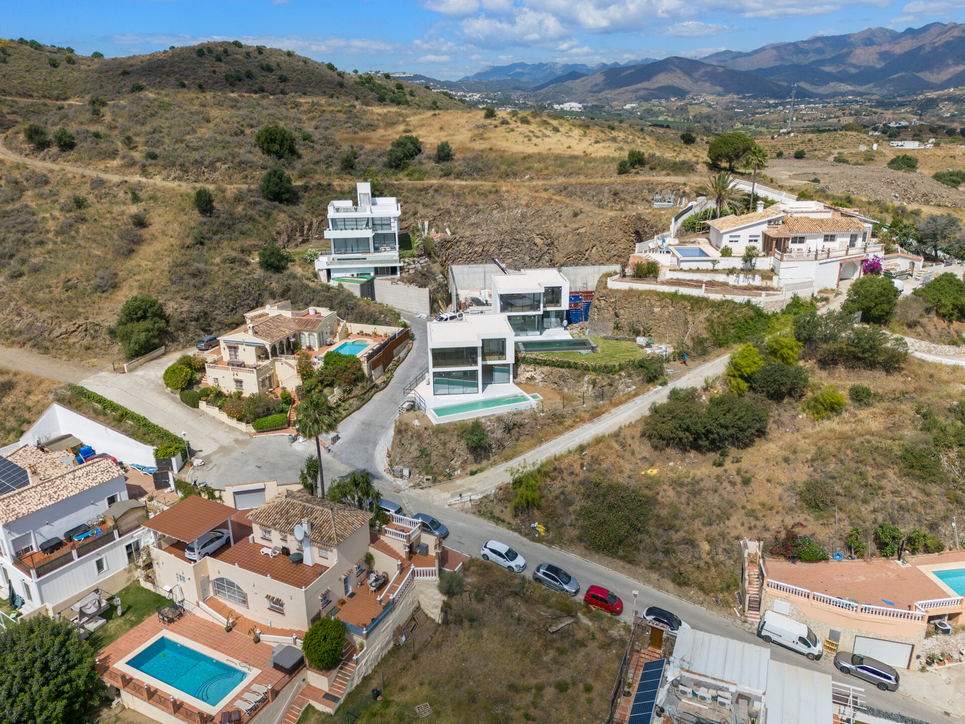 Chic new villa in a desirable gated community is a superb opportunity to live in luxury and elegance