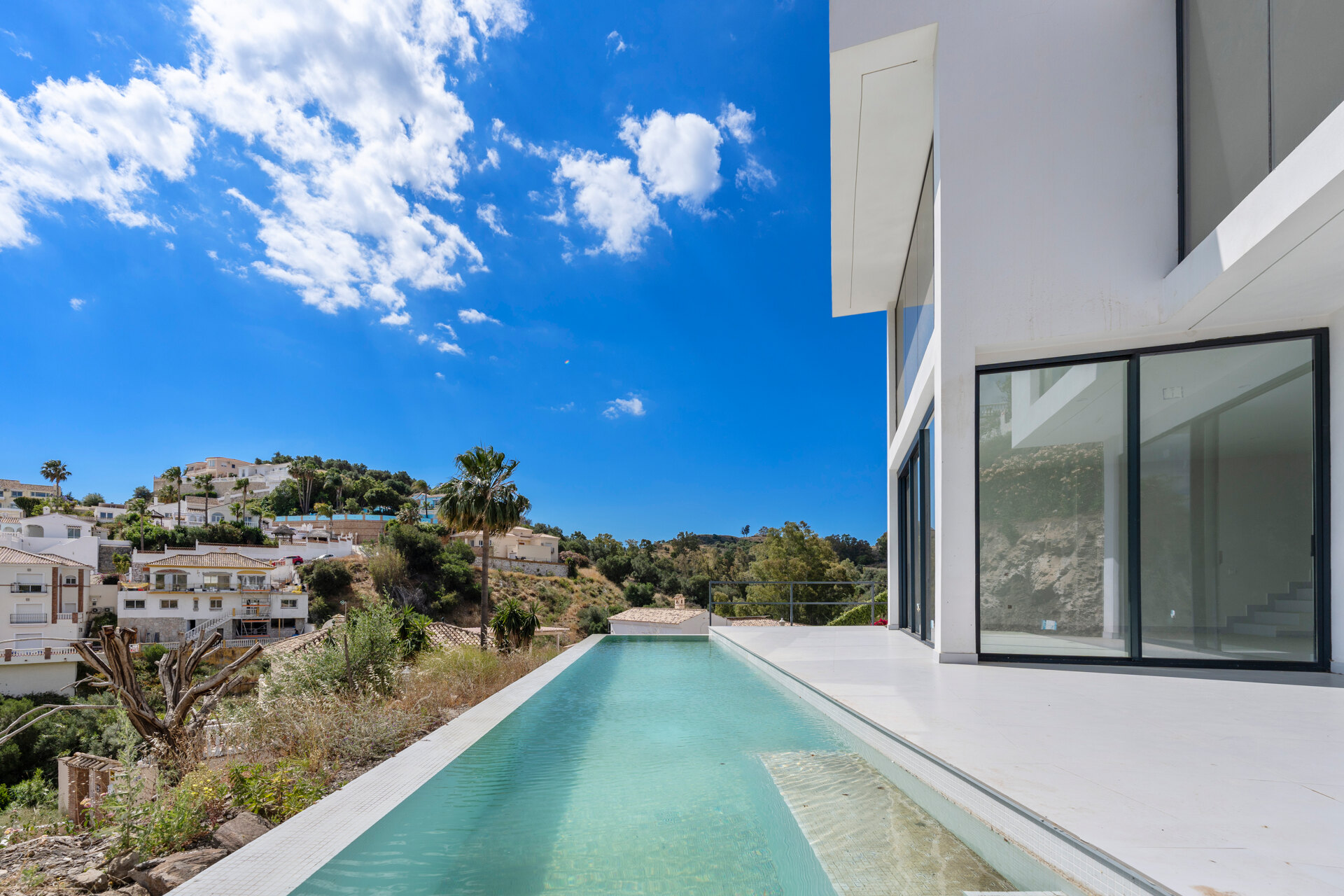 Chic new villa in a desirable gated community is a superb opportunity to live in luxury and elegance