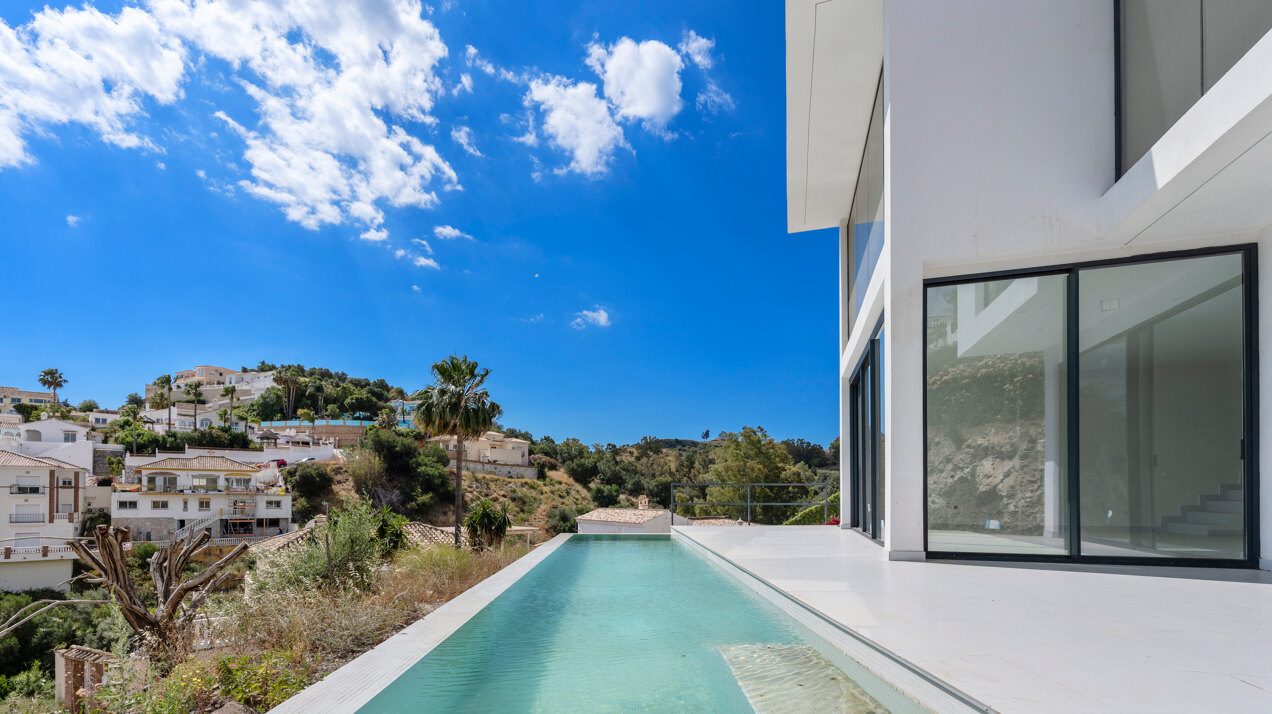 Chic new villa in a desirable gated community is a superb opportunity to live in luxury and elegance