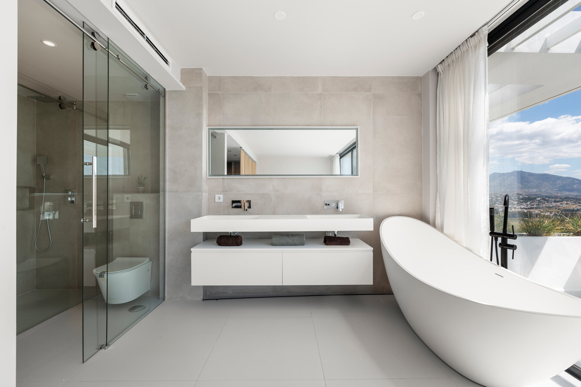 Chic new villa in a desirable gated community is a superb opportunity to live in luxury and elegance