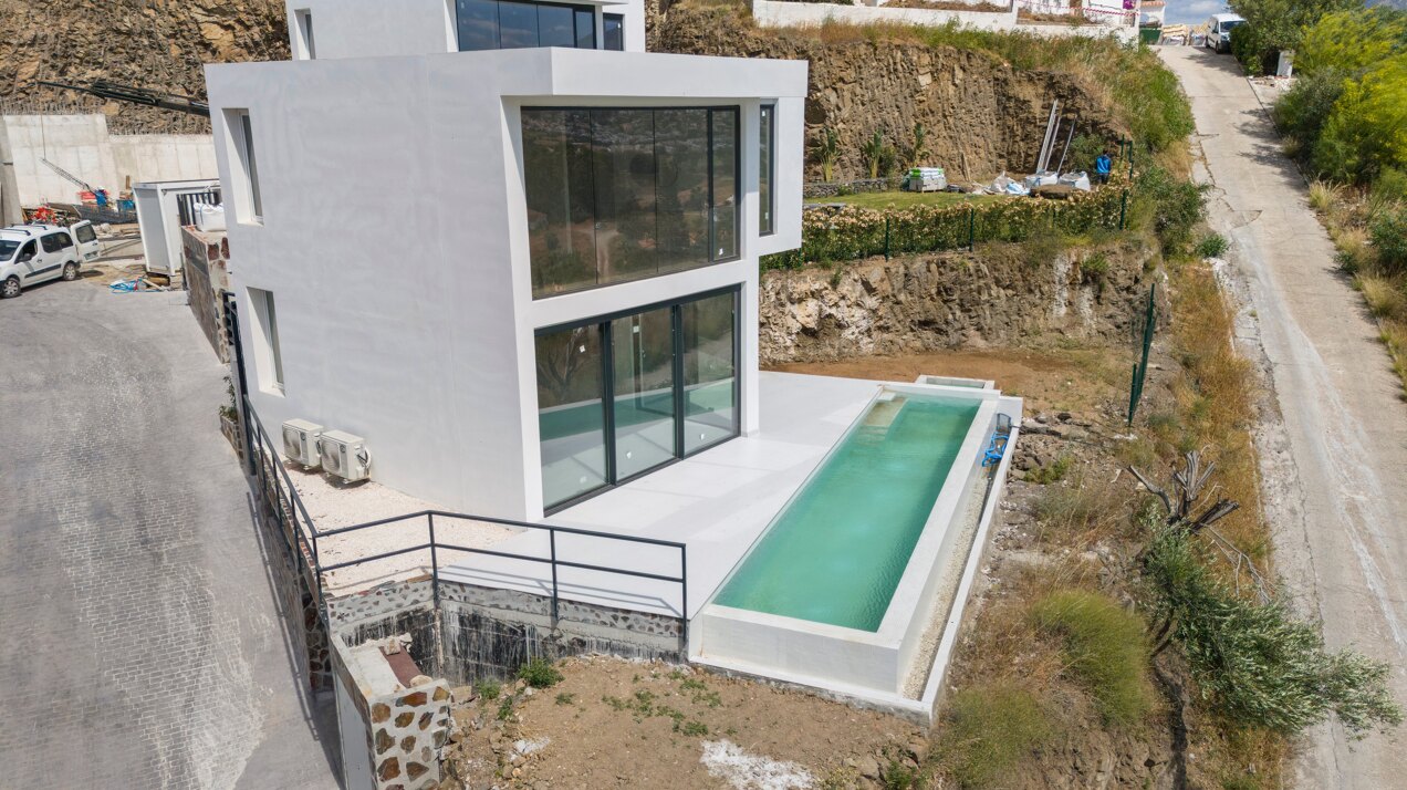 Chic new villa in a desirable gated community is a superb opportunity to live in luxury and elegance