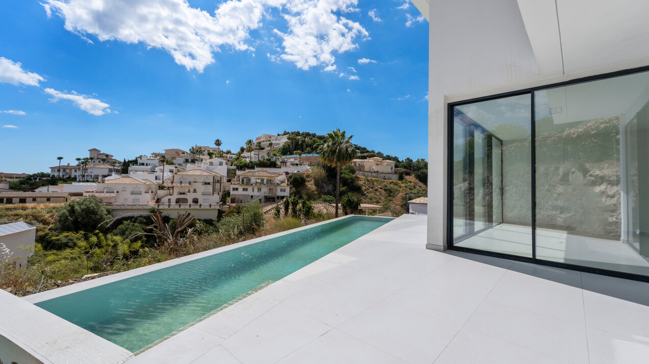 Chic new villa in a desirable gated community is a superb opportunity to live in luxury and elegance