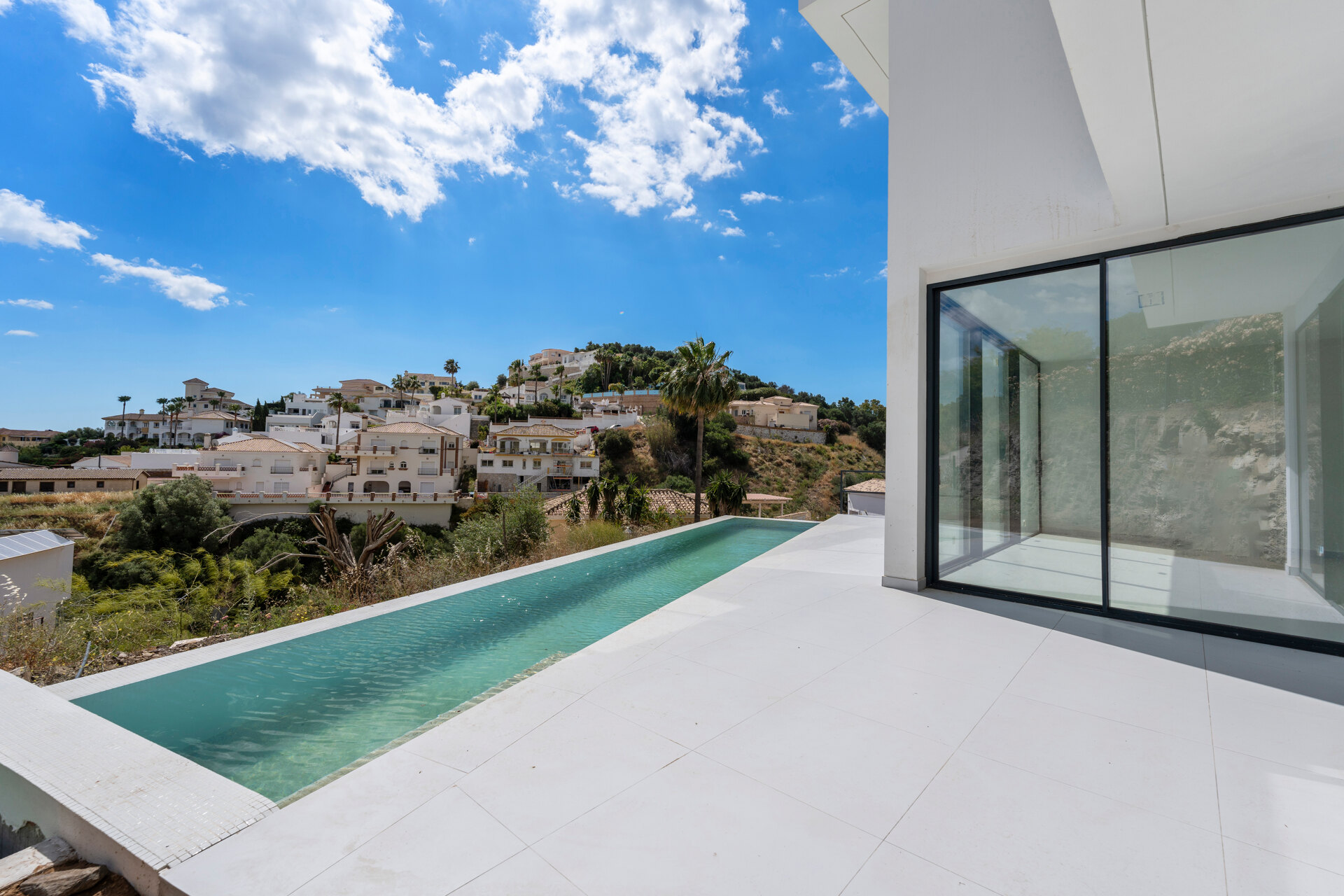 Chic new villa in a desirable gated community is a superb opportunity to live in luxury and elegance