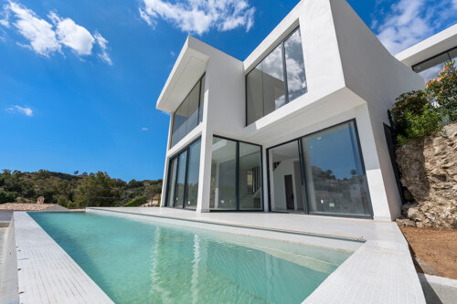 Chic new villa in a desirable gated community is a superb opportunity to live in luxury and elegance