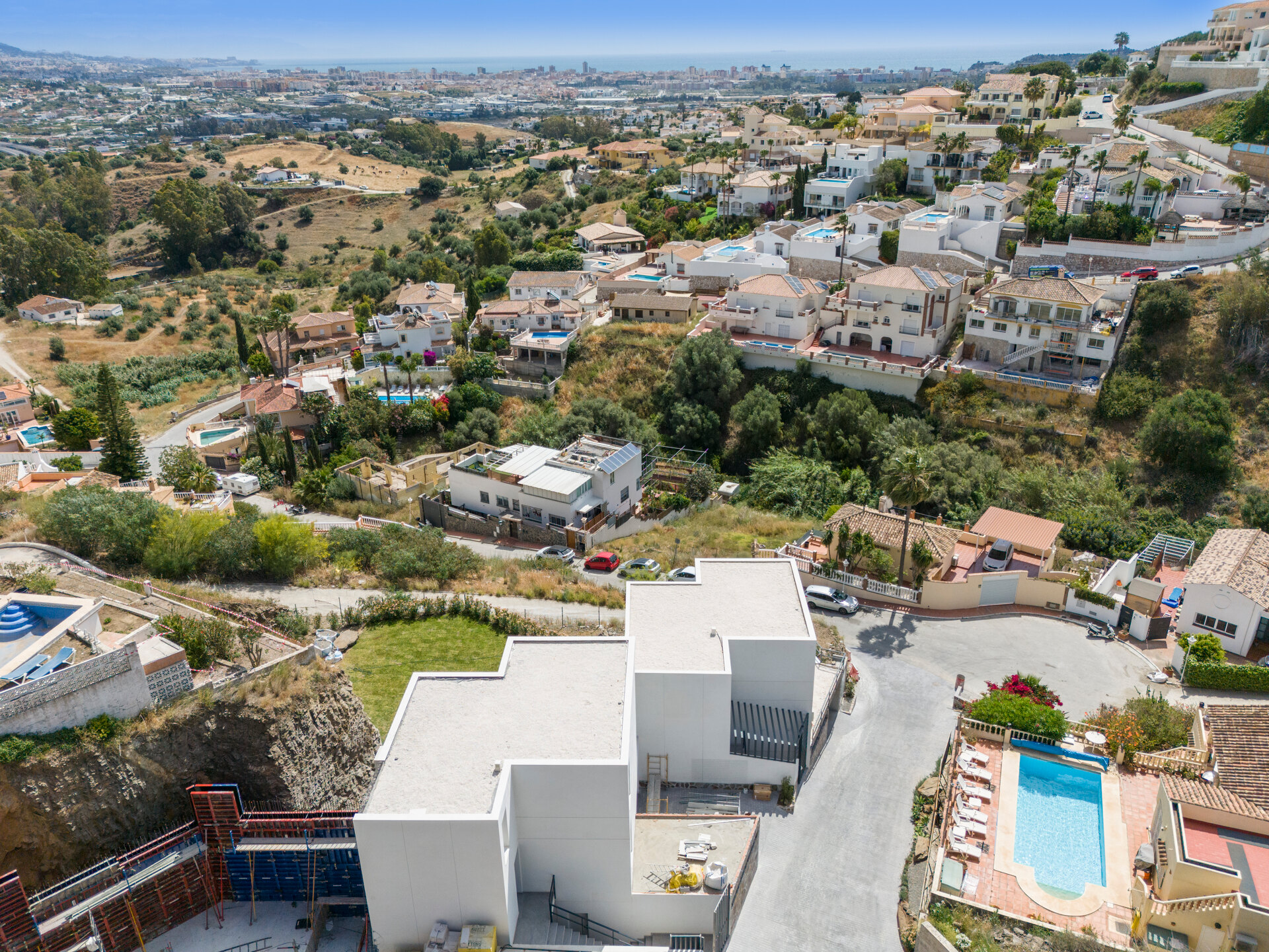 Chic new villa in a desirable gated community is a superb opportunity to live in luxury and elegance
