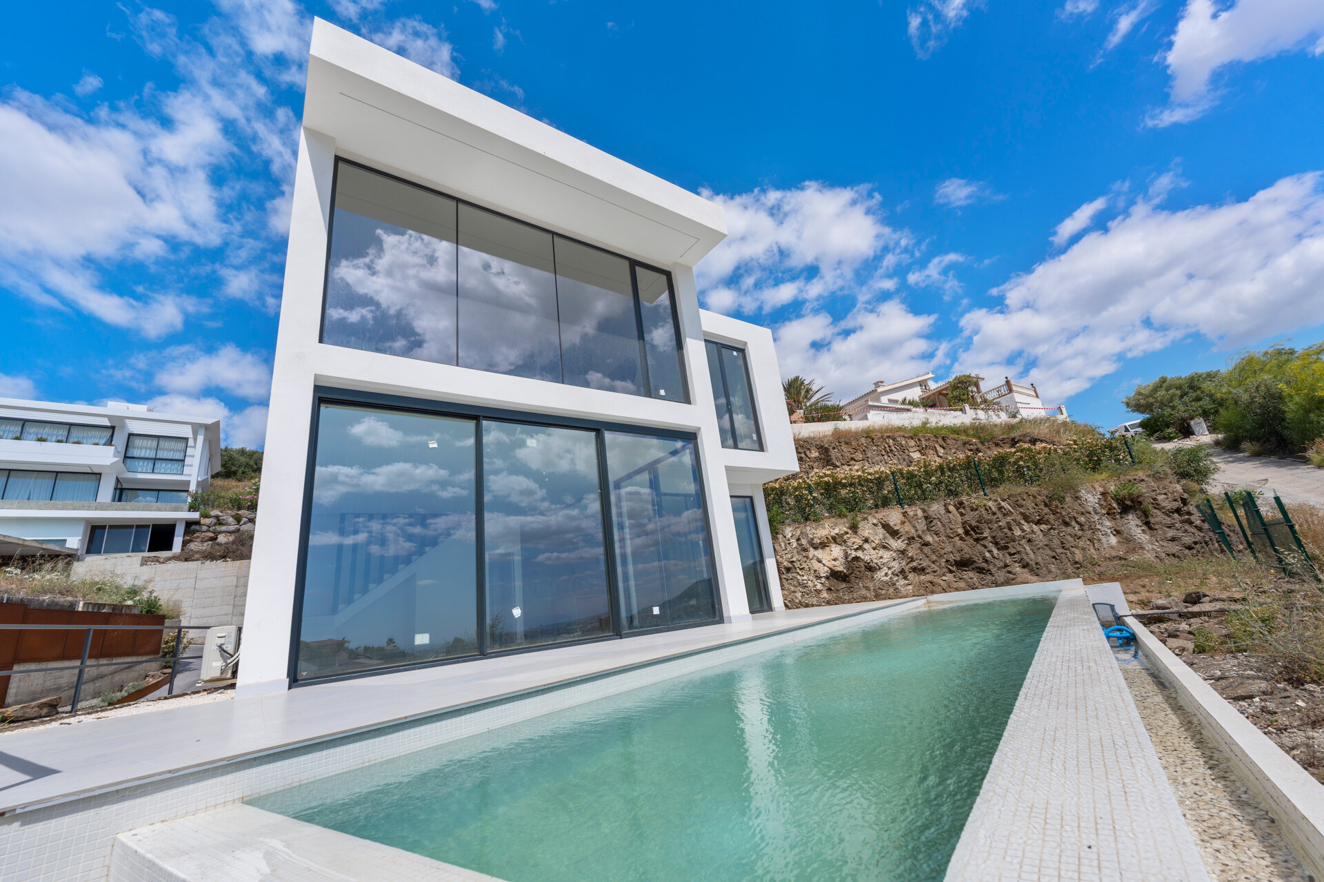 Chic new villa in a desirable gated community is a superb opportunity to live in luxury and elegance