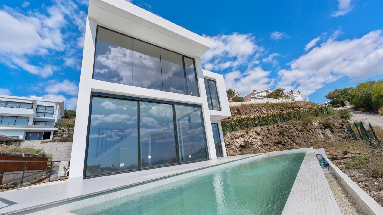 Chic new villa in a desirable gated community is a superb opportunity to live in luxury and elegance