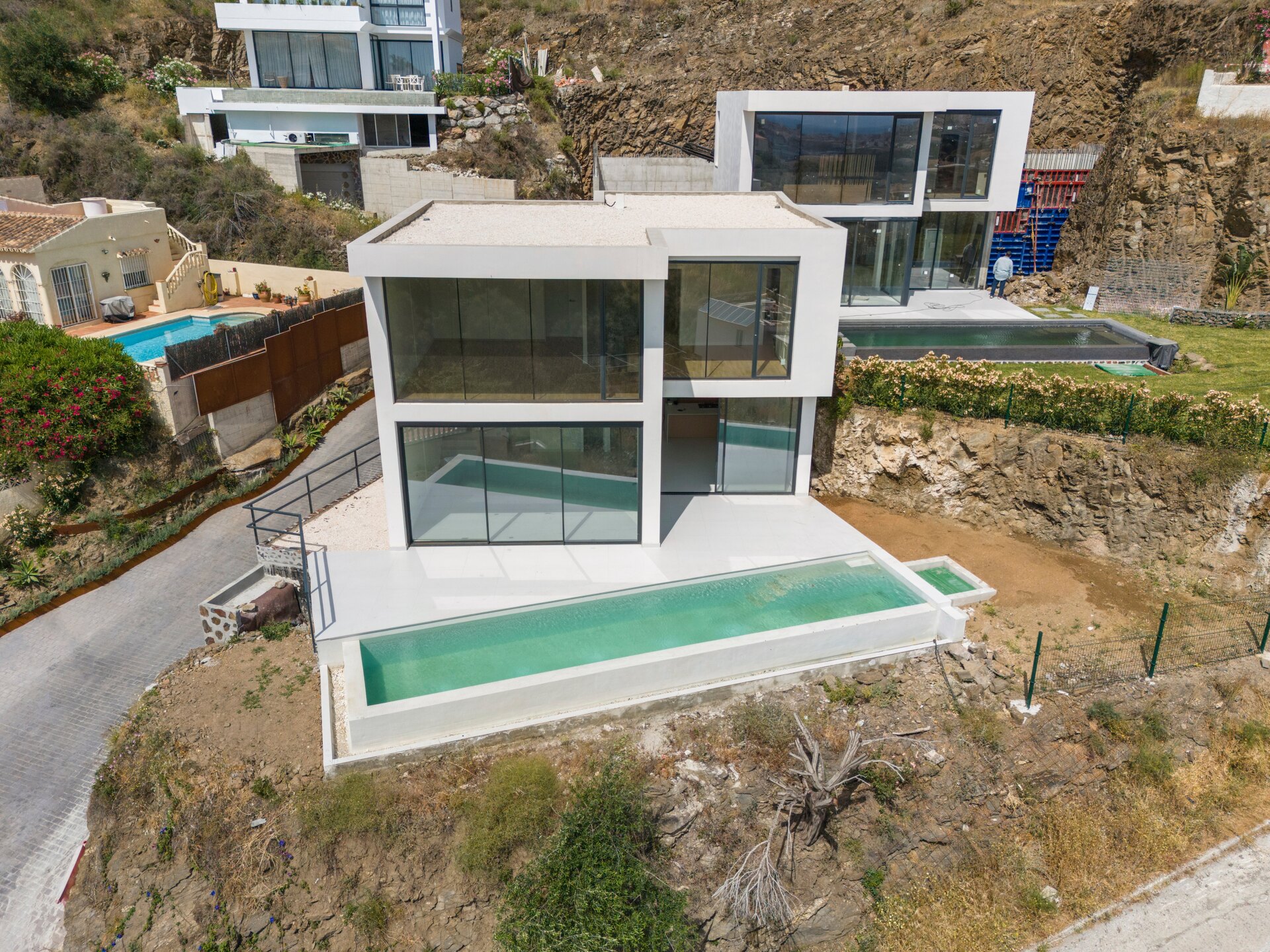 Chic new villa in a desirable gated community is a superb opportunity to live in luxury and elegance