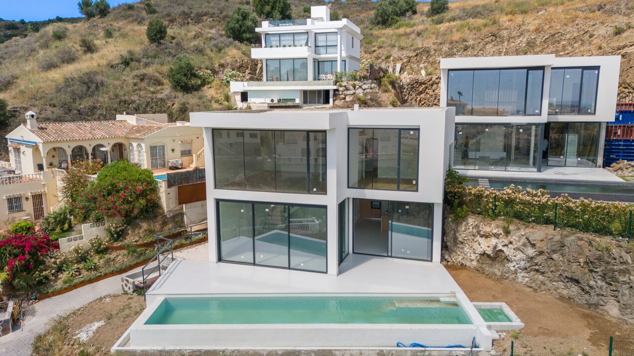 Chic new villa in a desirable gated community is a superb opportunity to live in luxury and elegance
