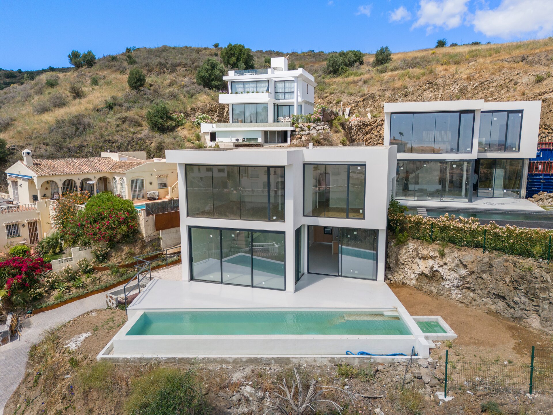 Chic new villa in a desirable gated community is a superb opportunity to live in luxury and elegance