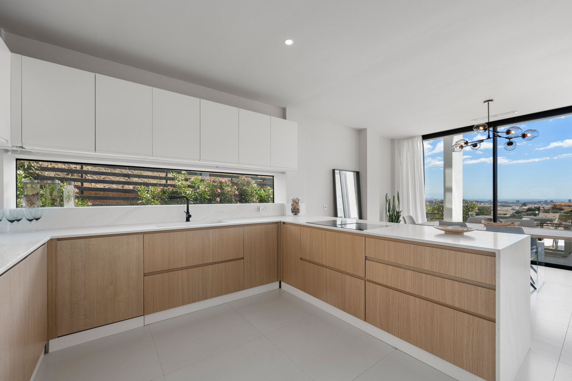 Chic new villa in a desirable gated community is a superb opportunity to live in luxury and elegance