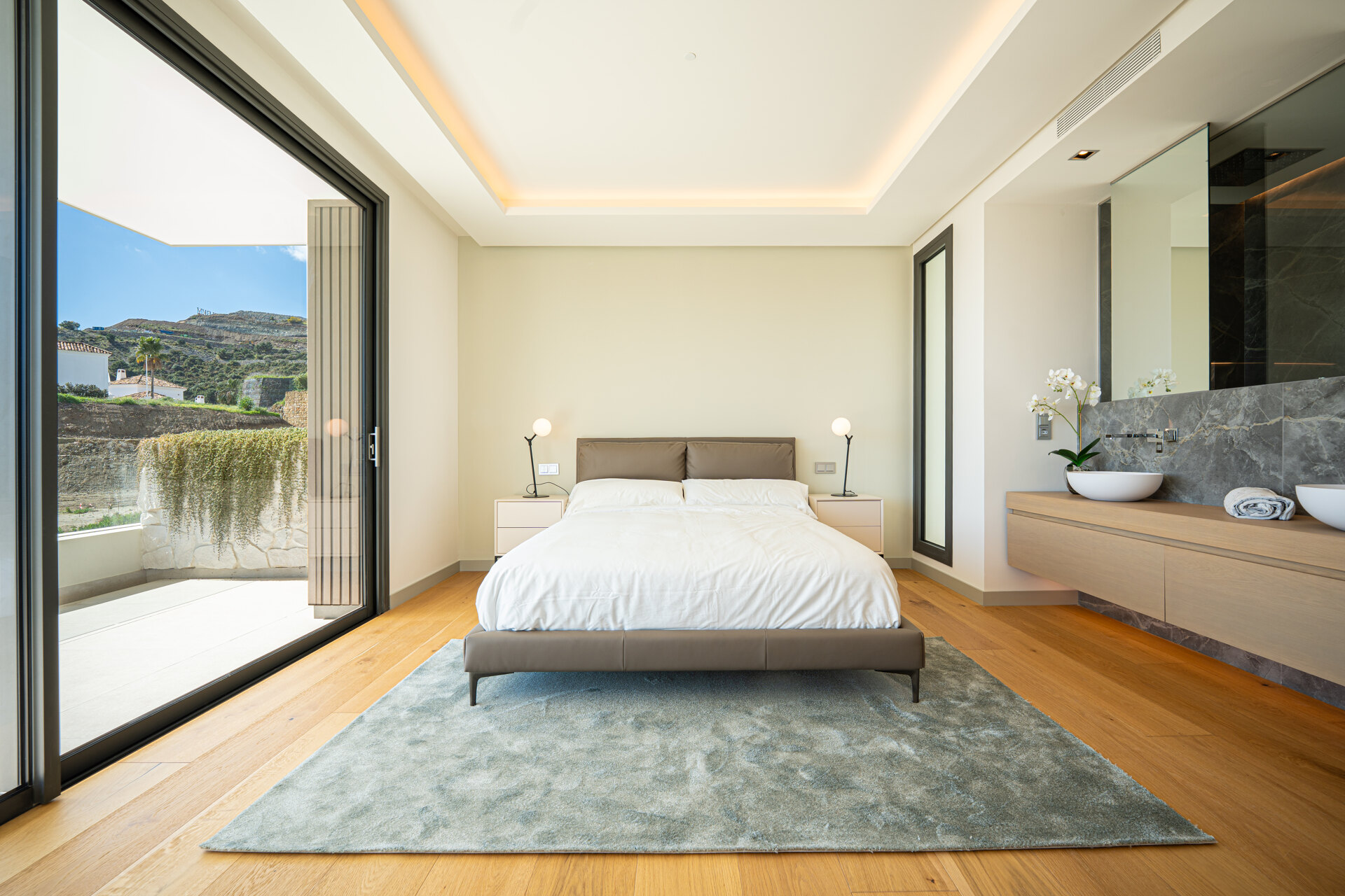 Outstanding new villa sits high above La Quinta, showcasing 360º sea and mountain views