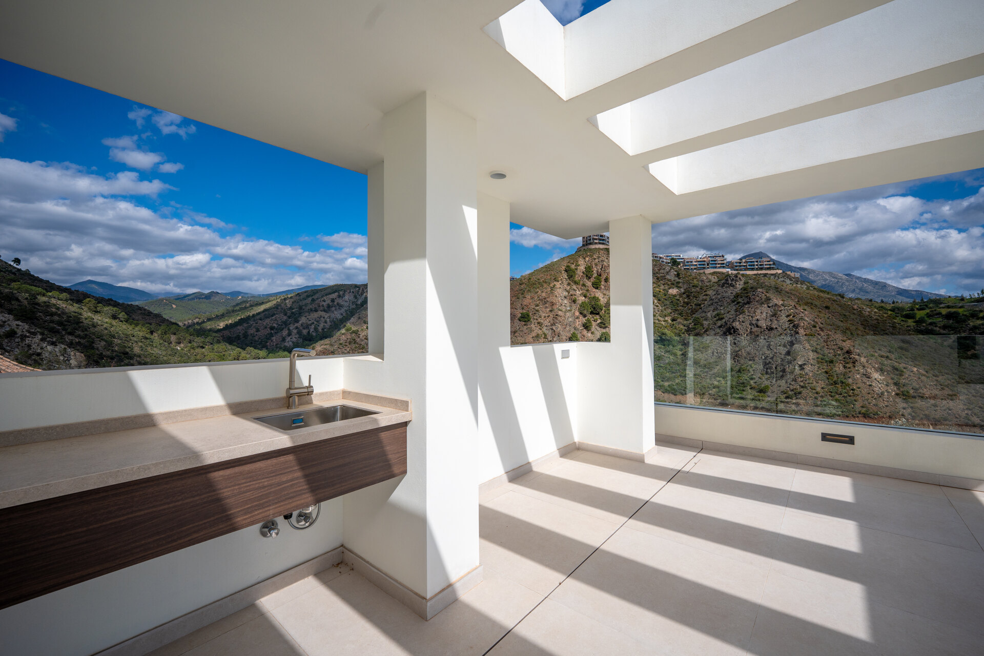 Outstanding new villa sits high above La Quinta, showcasing 360º sea and mountain views