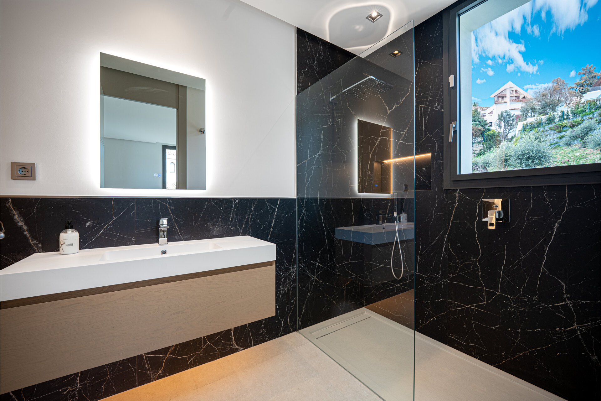 Outstanding new villa sits high above La Quinta, showcasing 360º sea and mountain views