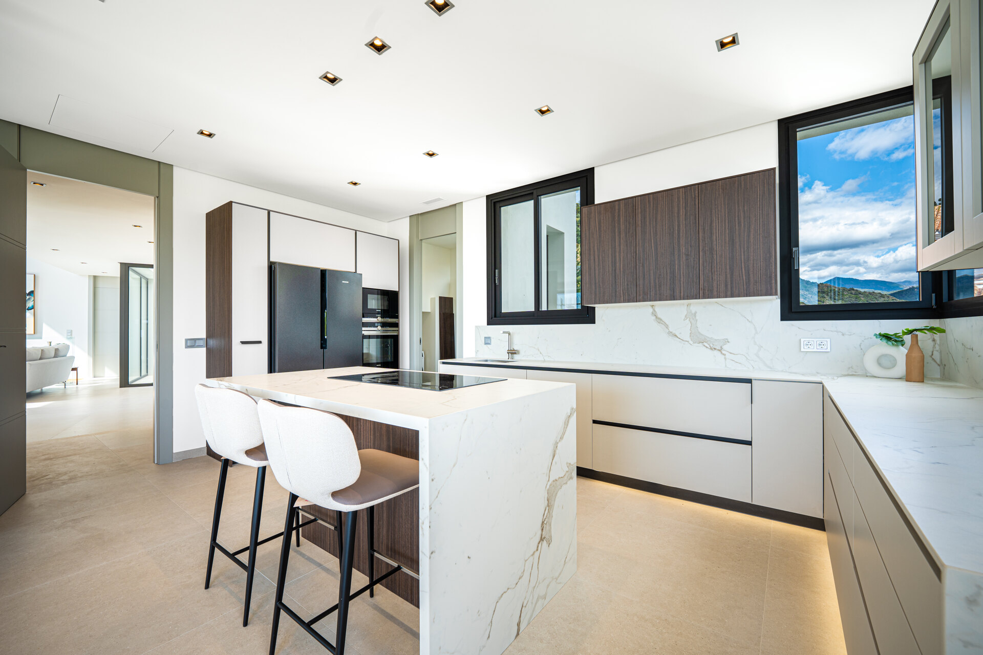 Outstanding new villa sits high above La Quinta, showcasing 360º sea and mountain views