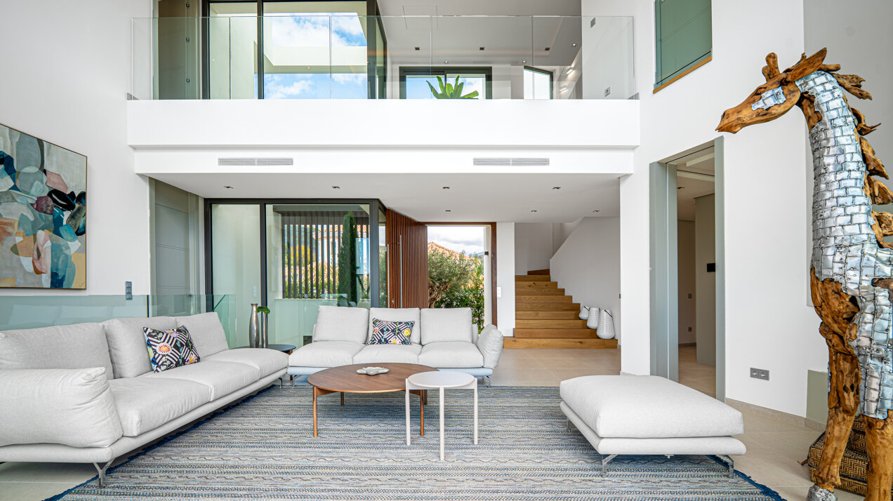 Outstanding new villa sits high above La Quinta, showcasing 360º sea and mountain views