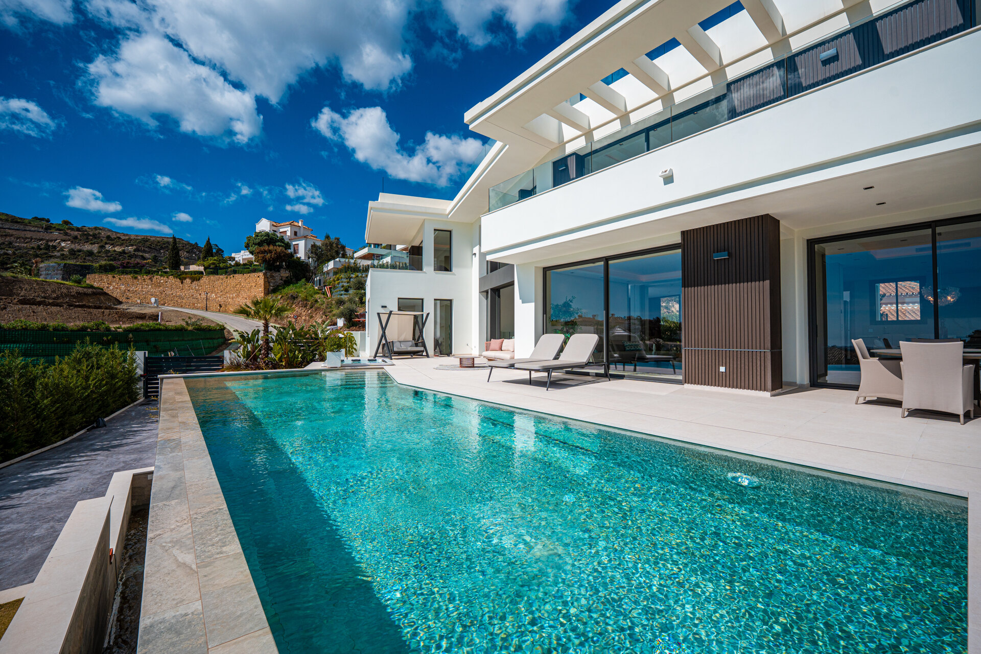 Outstanding new villa sits high above La Quinta, showcasing 360º sea and mountain views
