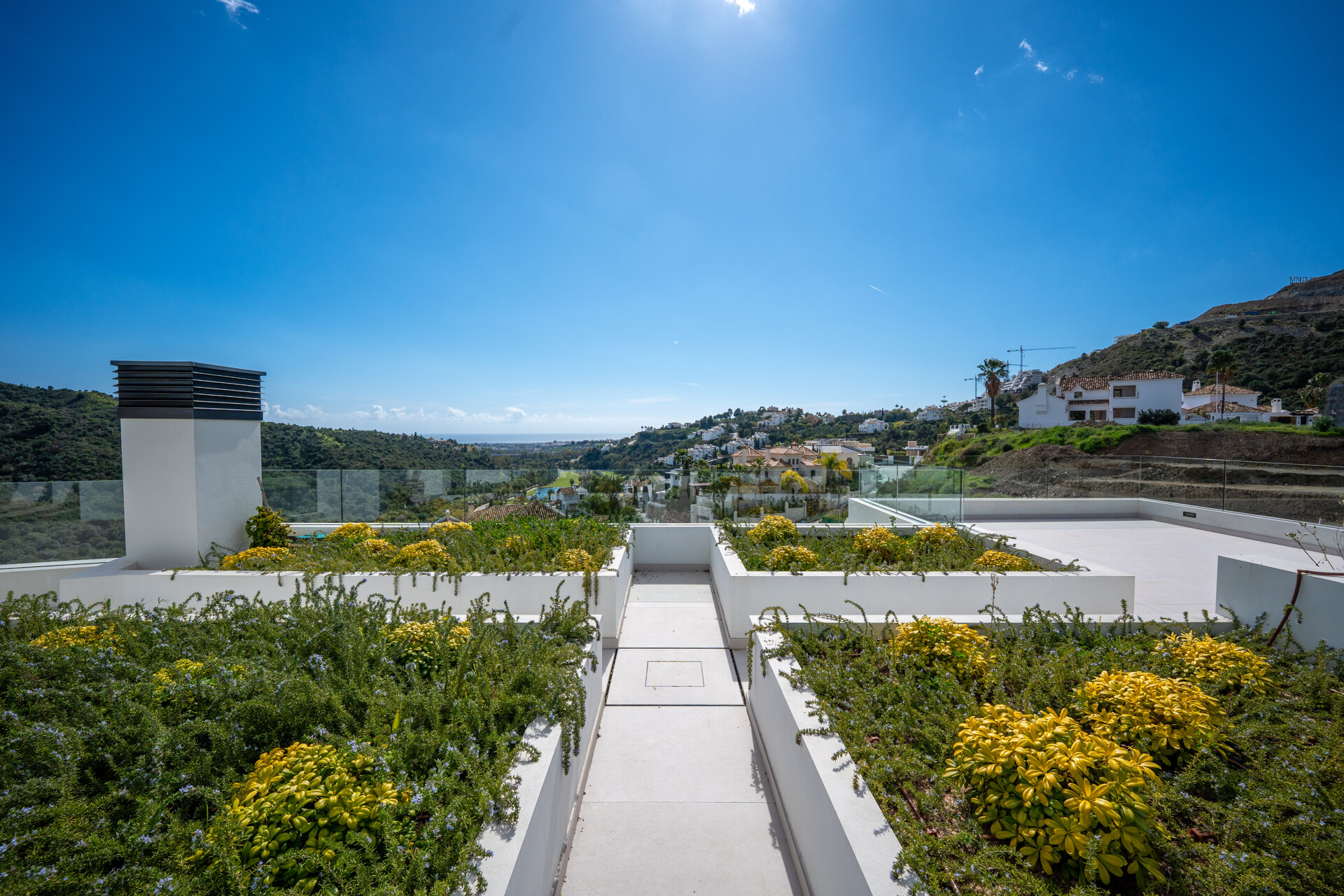 Outstanding new villa sits high above La Quinta, showcasing 360º sea and mountain views
