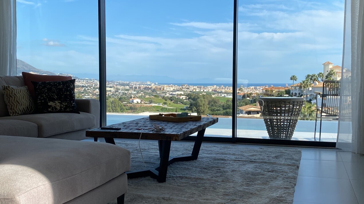 A meticulously designed new villa that embodies modern luxury, offers breathtaking views & privacy.