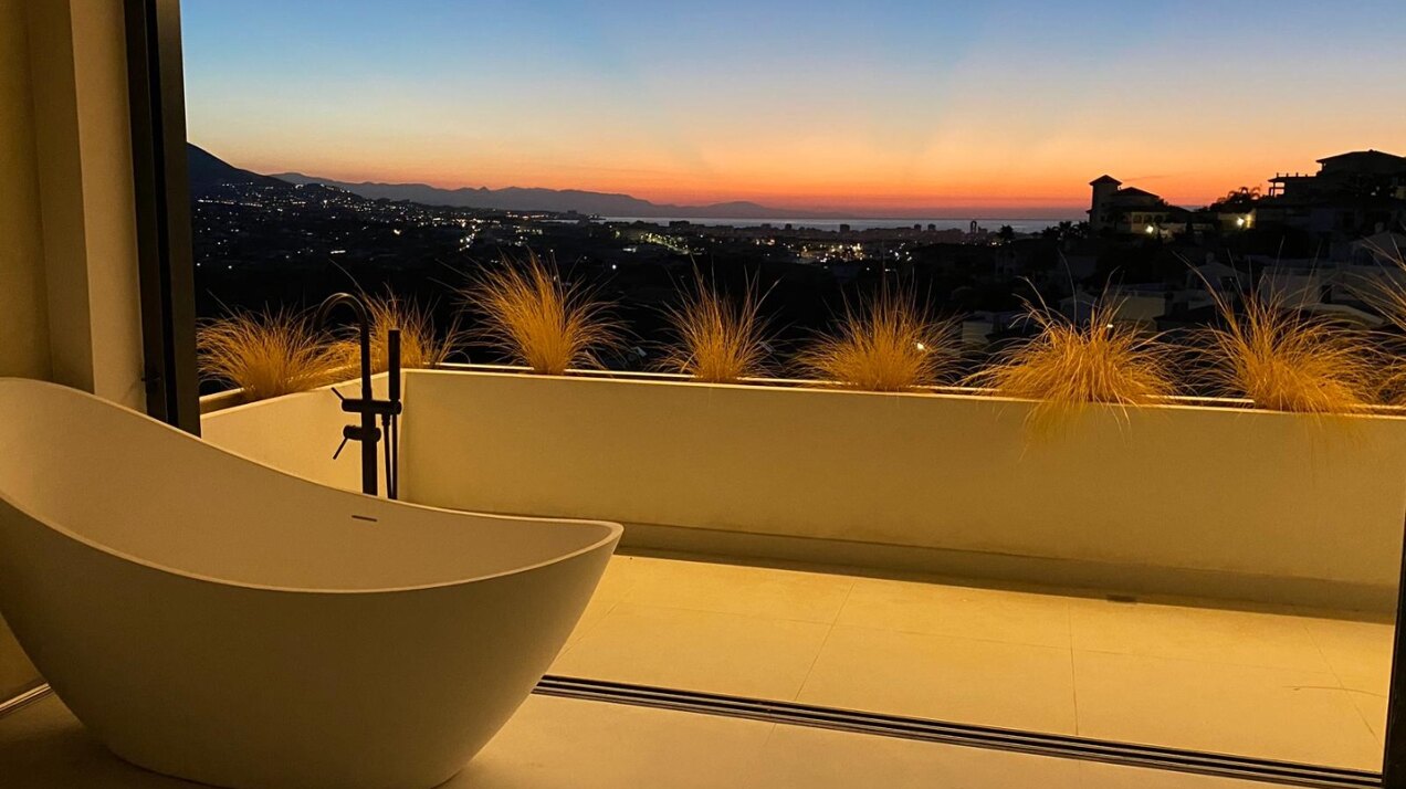 A meticulously designed new villa that embodies modern luxury, offers breathtaking views & privacy.