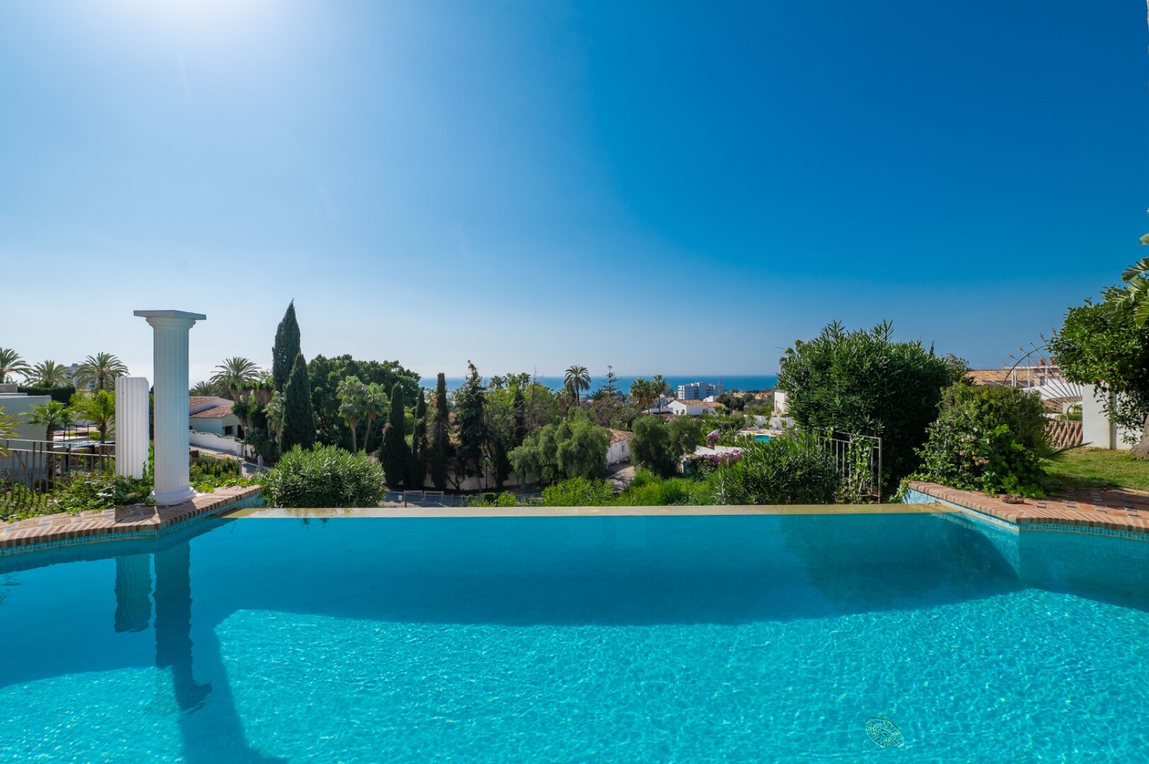 Stunning family villa with panoramic coastline views can be found in sought after area of Marbella