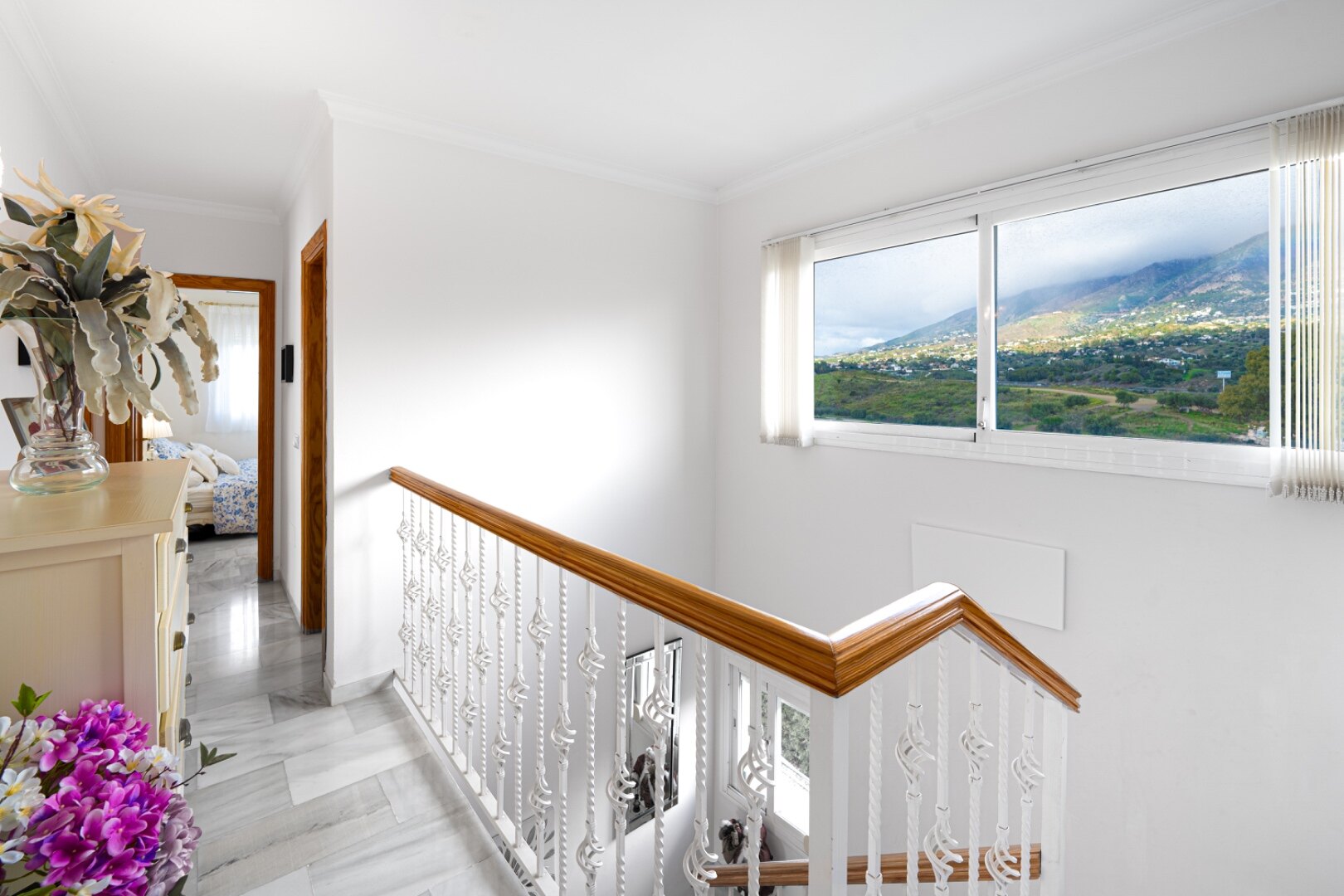 Serene and elegant, this villa stands out overlooking the Mijas countryside down towards the coast