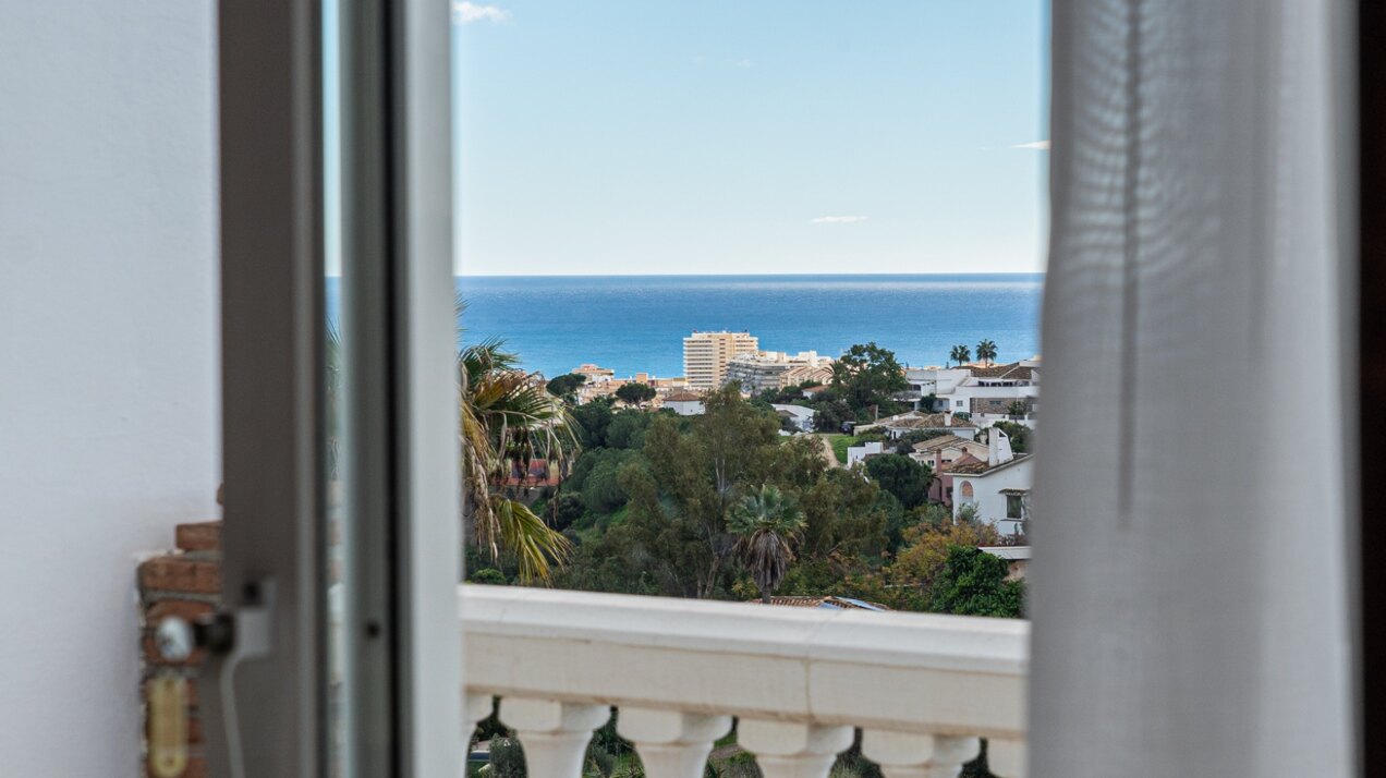 Serene and elegant, this villa stands out overlooking the Mijas countryside down towards the coast