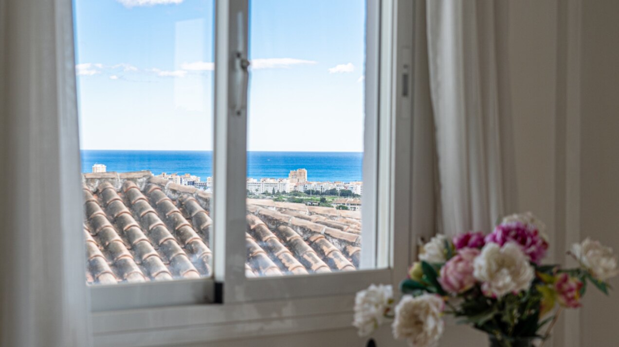 Serene and elegant, this villa stands out overlooking the Mijas countryside down towards the coast