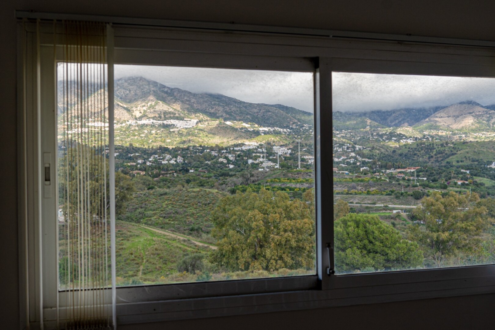 Serene and elegant, this villa stands out overlooking the Mijas countryside down towards the coast