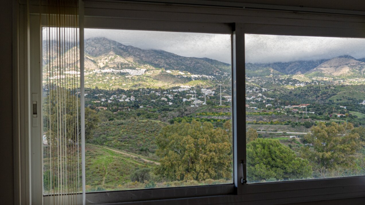 Serene and elegant, this villa stands out overlooking the Mijas countryside down towards the coast