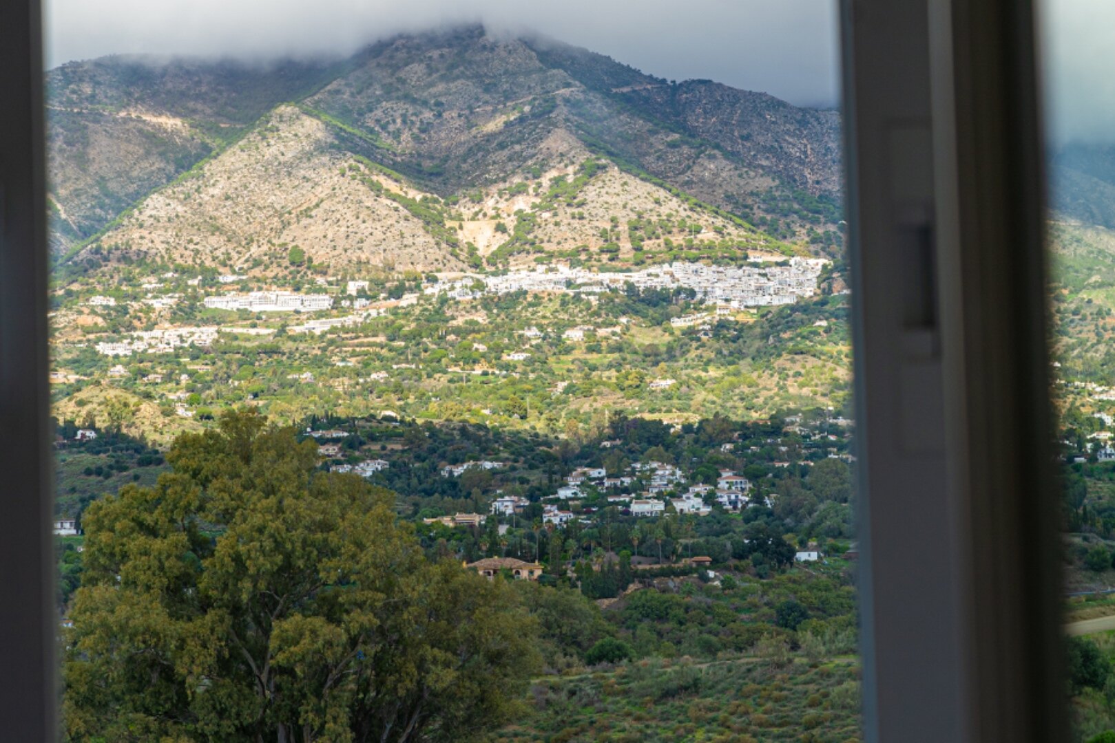 Serene and elegant, this villa stands out overlooking the Mijas countryside down towards the coast