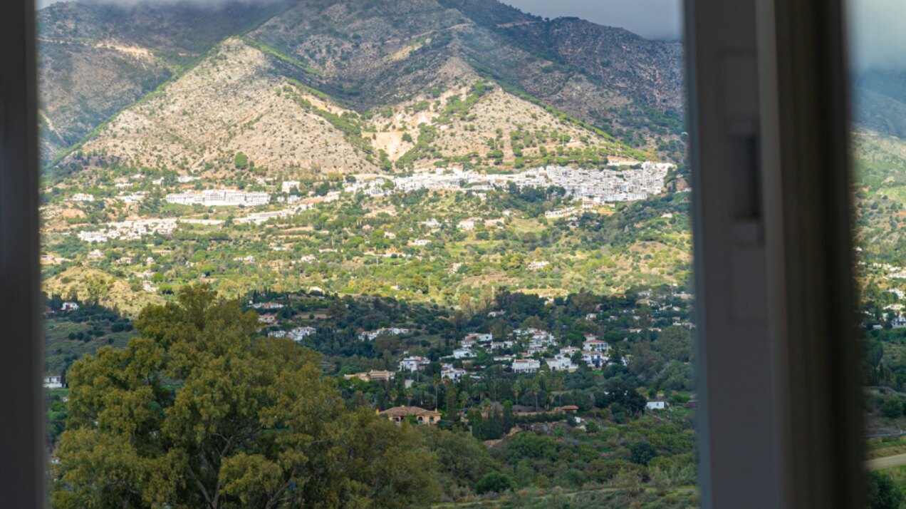 Serene and elegant, this villa stands out overlooking the Mijas countryside down towards the coast