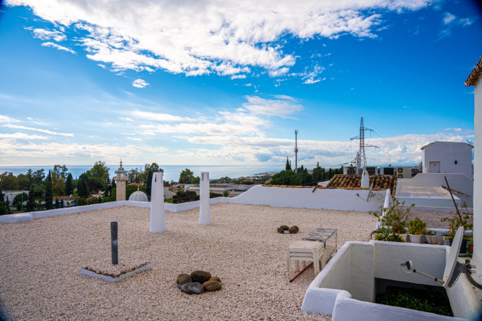 Stunning Marbella penthouse exudes elegance from its prime location within elite gated community.