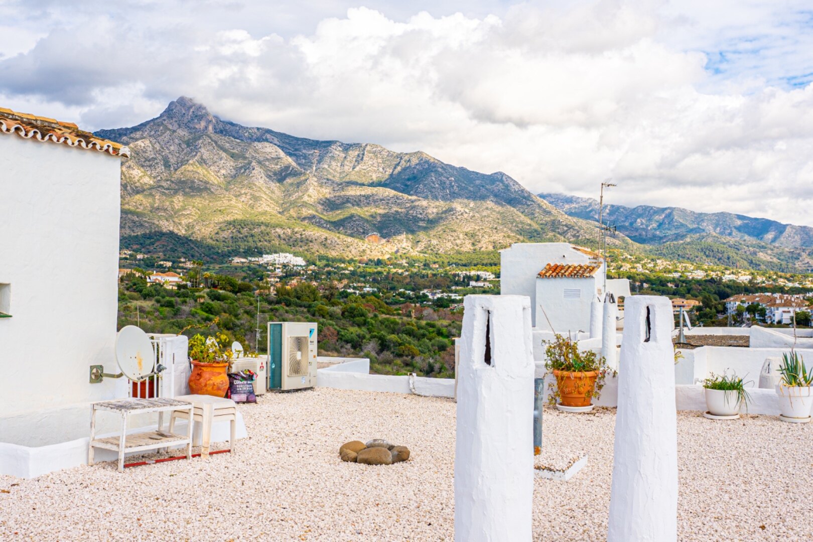 Stunning Marbella penthouse exudes elegance from its prime location within elite gated community.
