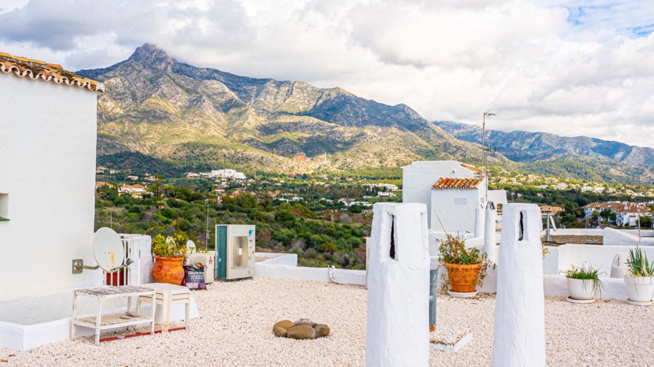 Stunning Marbella penthouse exudes elegance from its prime location within elite gated community.