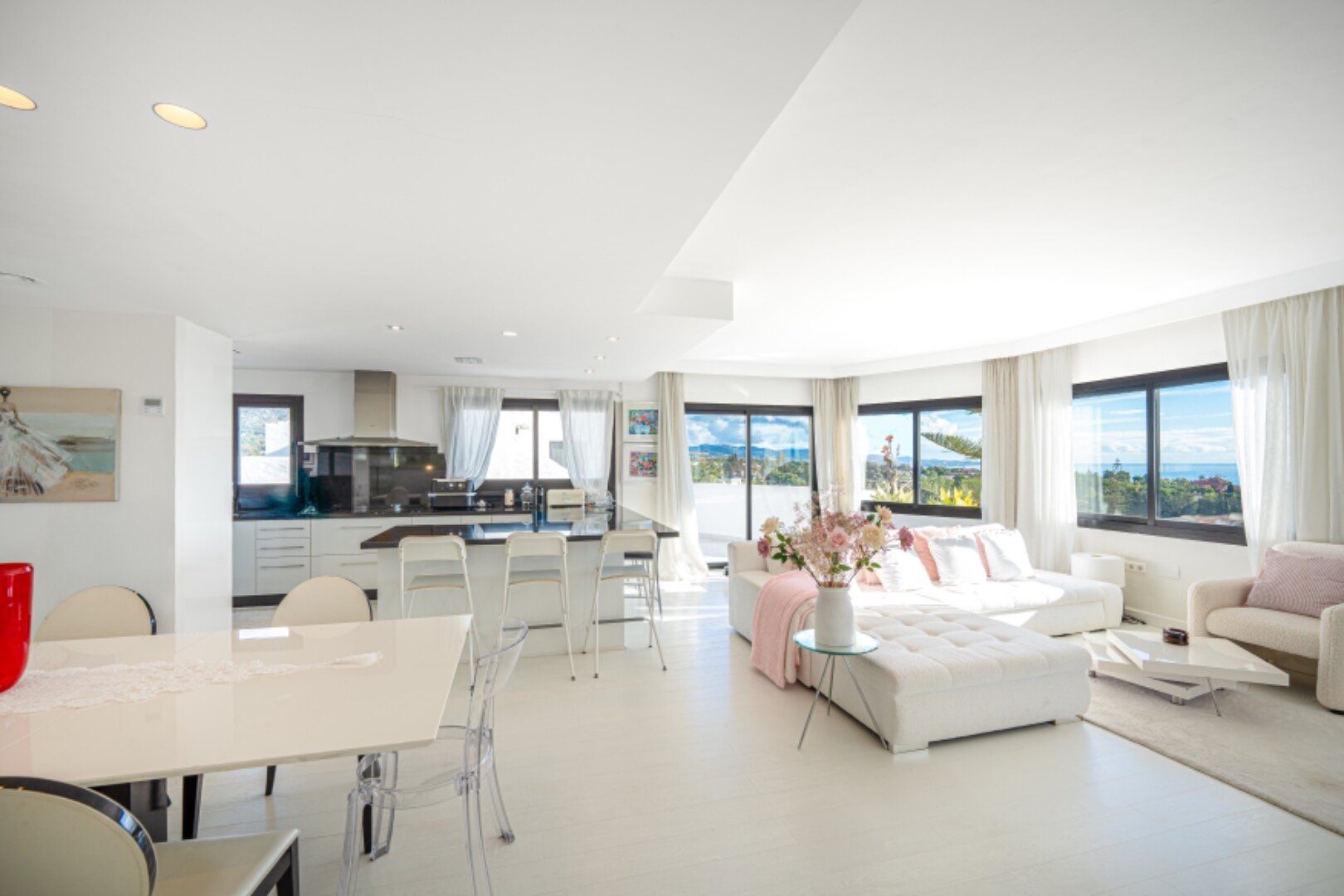 Stunning Marbella penthouse exudes elegance from its prime location within elite gated community.