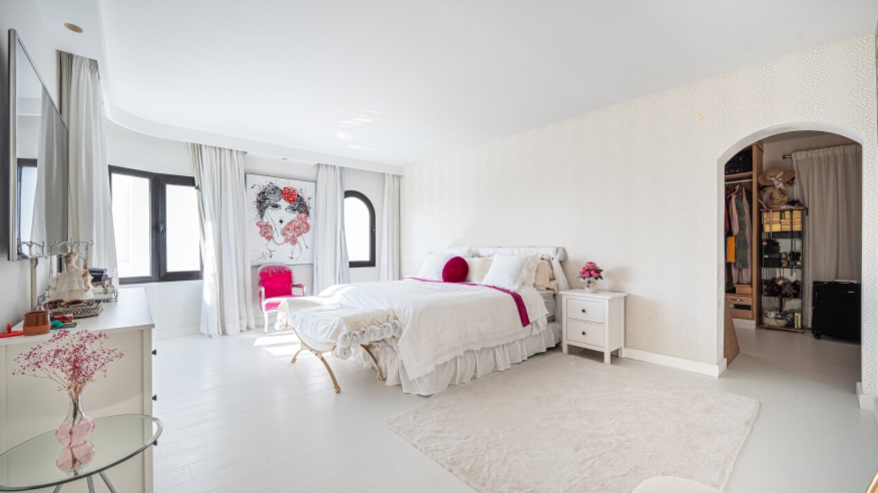 Stunning Marbella penthouse exudes elegance from its prime location within elite gated community.