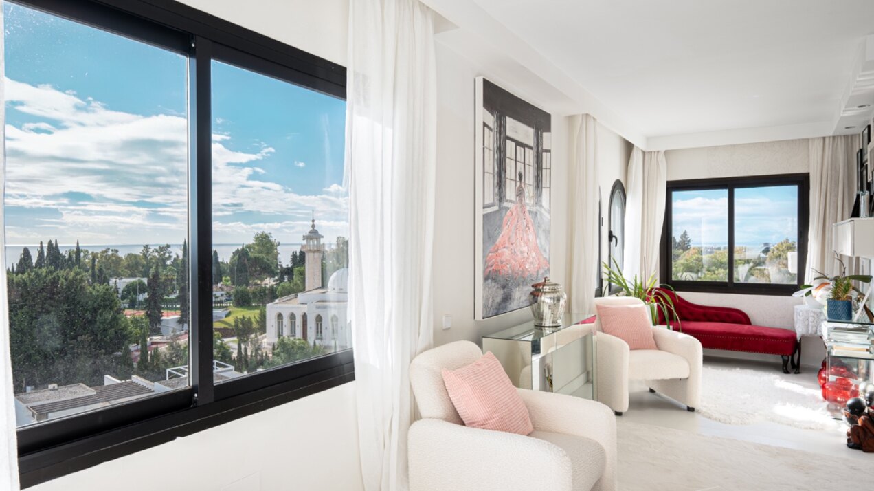 Stunning Marbella penthouse exudes elegance from its prime location within elite gated community.