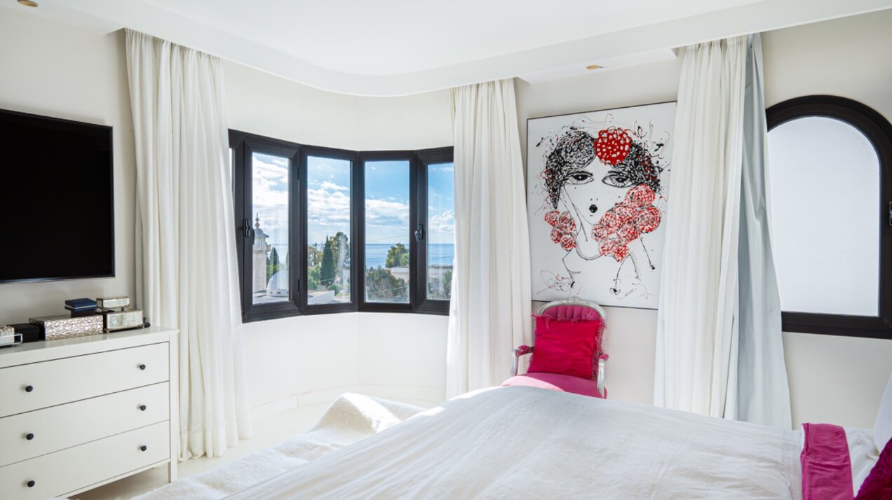 Stunning Marbella penthouse exudes elegance from its prime location within elite gated community.
