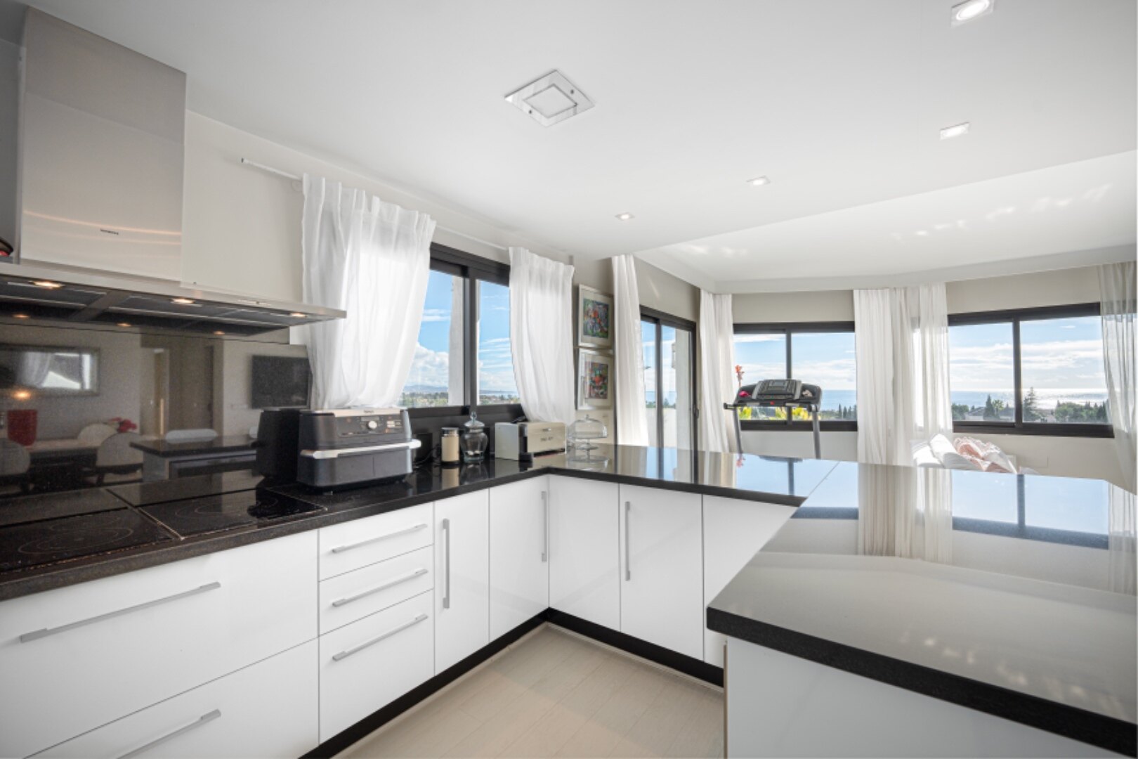 Stunning Marbella penthouse exudes elegance from its prime location within elite gated community.