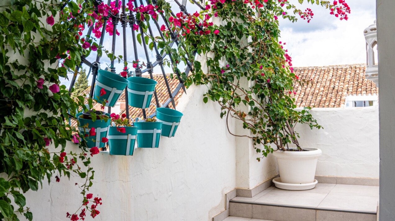 Stunning Marbella penthouse exudes elegance from its prime location within elite gated community.