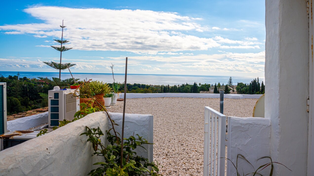 Stunning Marbella penthouse exudes elegance from its prime location within elite gated community.