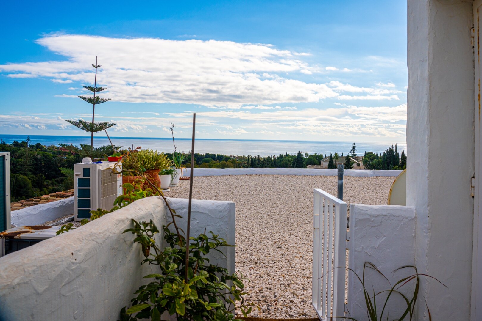Stunning Marbella penthouse exudes elegance from its prime location within elite gated community.