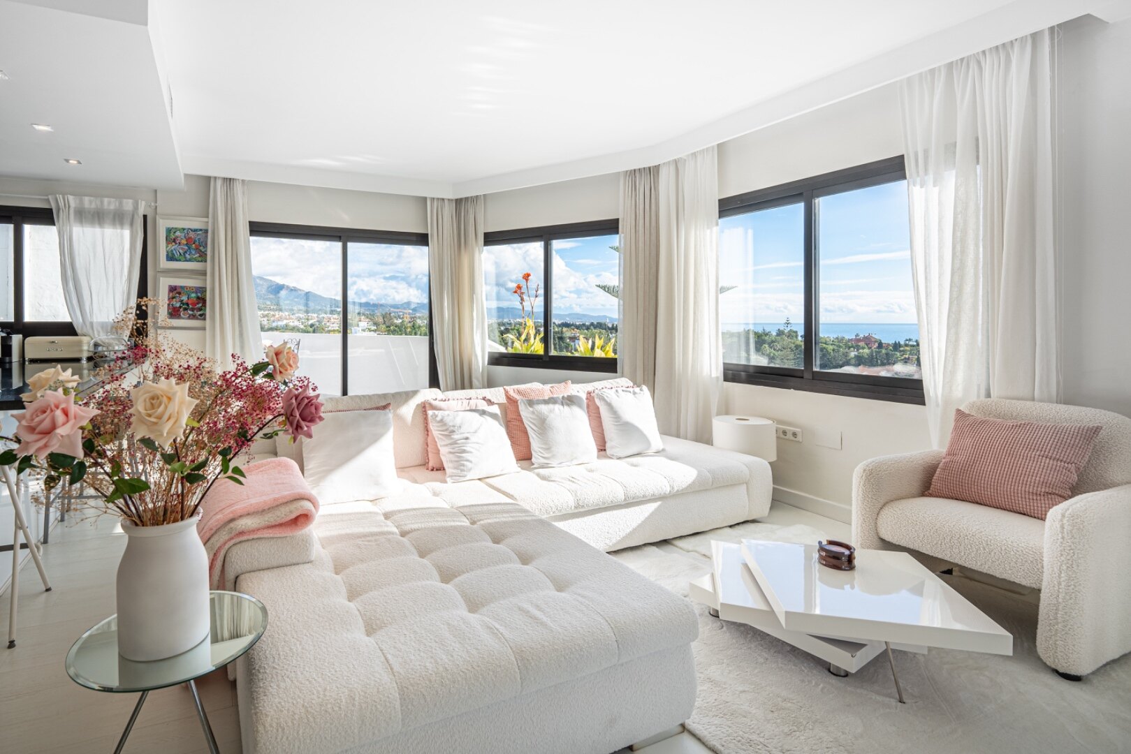 Stunning Marbella penthouse exudes elegance from its prime location within elite gated community.