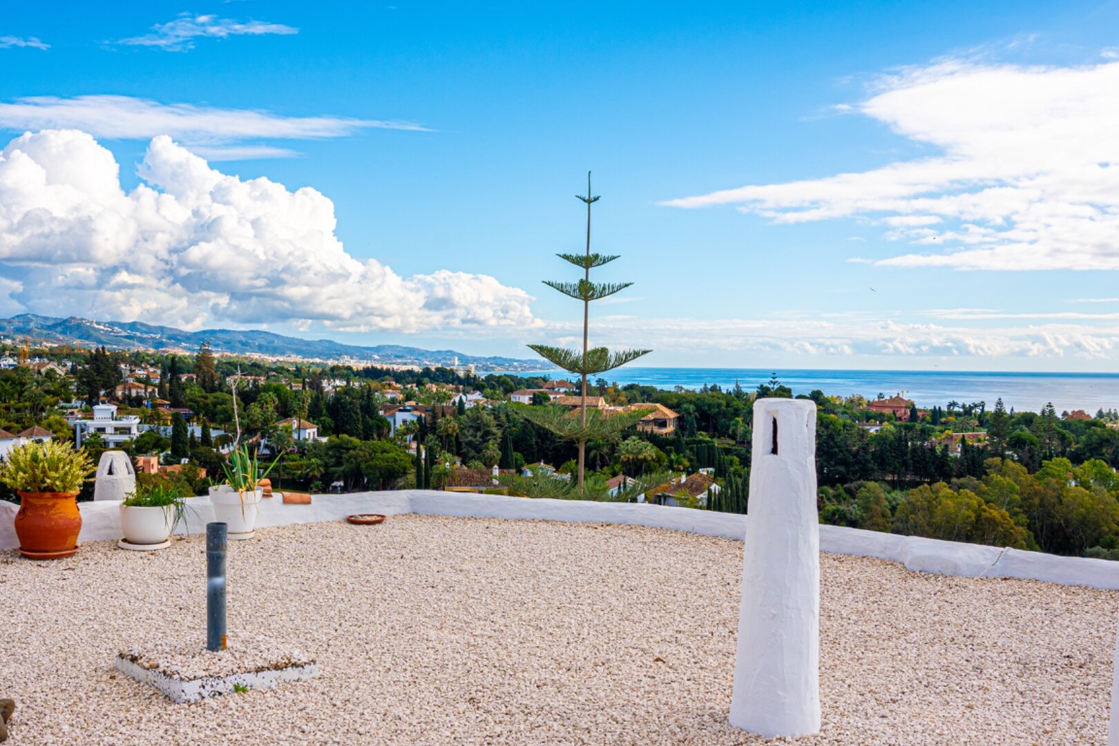 Stunning Marbella penthouse exudes elegance from its prime location within elite gated community.