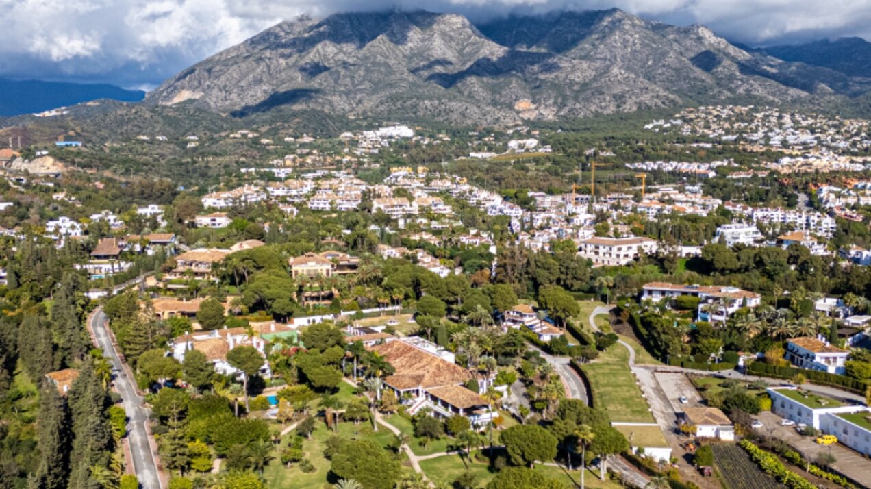 Stunning Marbella penthouse exudes elegance from its prime location within elite gated community.