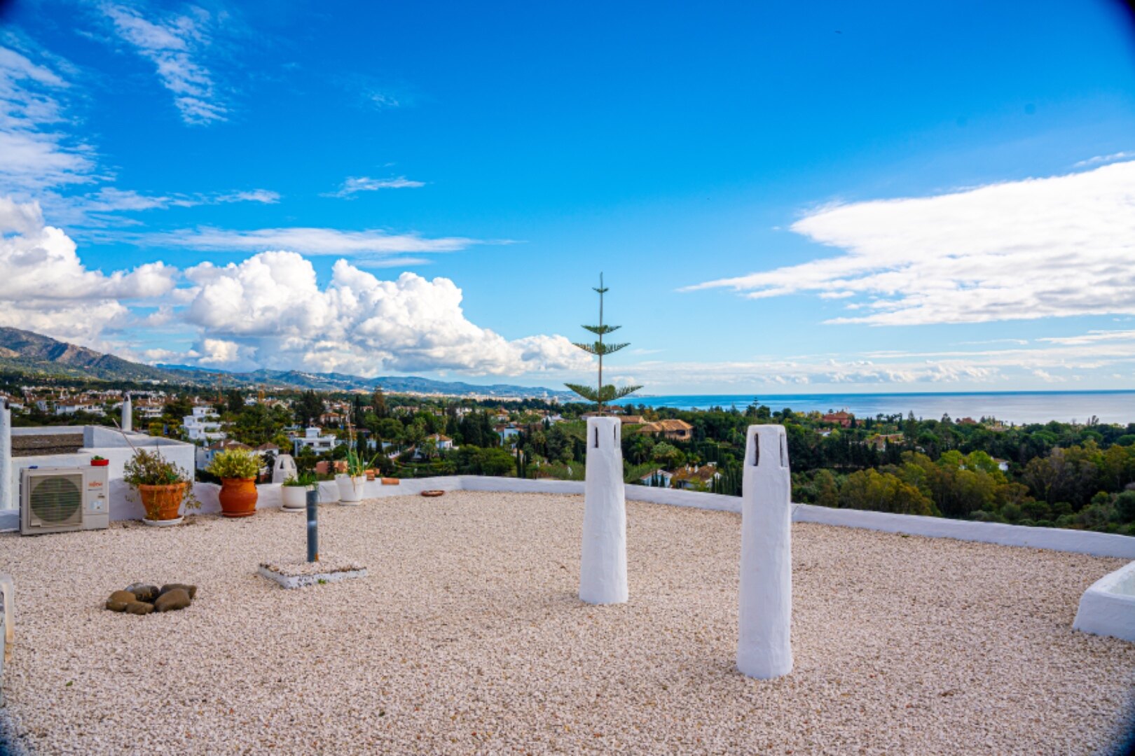 Stunning Marbella penthouse exudes elegance from its prime location within elite gated community.