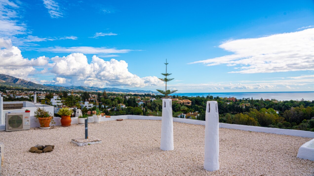 Stunning Marbella penthouse exudes elegance from its prime location within elite gated community.