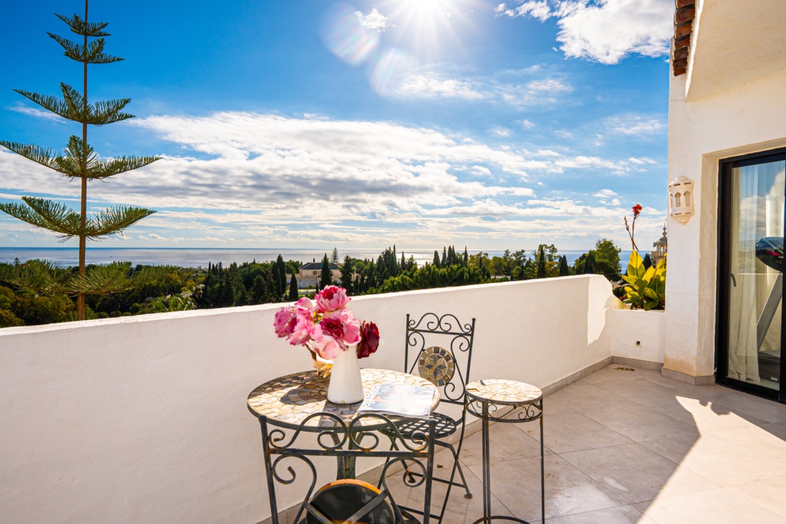 Stunning Marbella penthouse exudes elegance from its prime location within elite gated community.